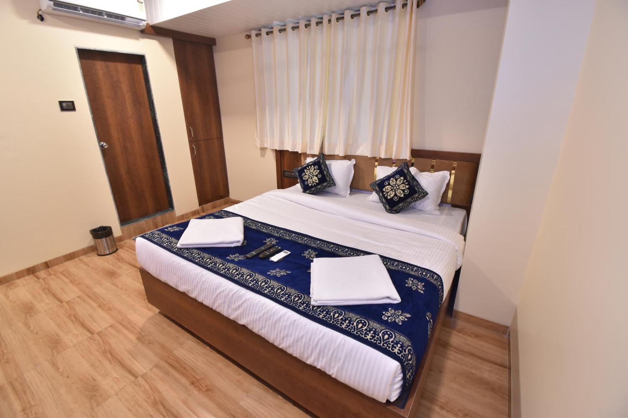 Hotel Starlit Navi Mumbai Cameră foto